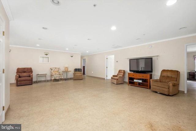 sitting room featuring ornamental molding