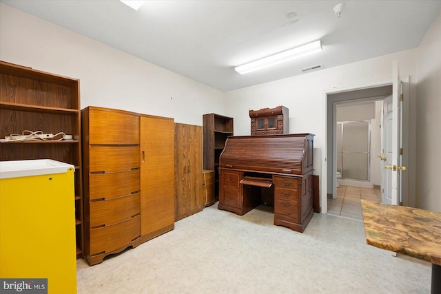 miscellaneous room with light colored carpet