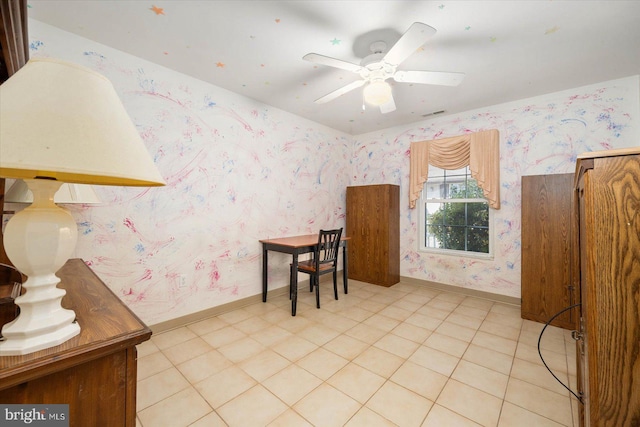 interior space featuring ceiling fan and light tile floors