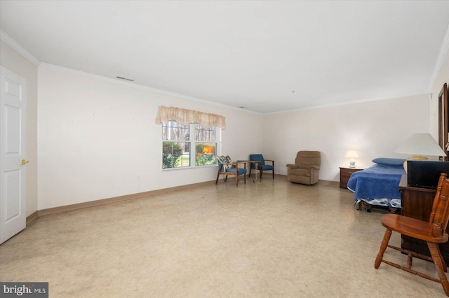 sitting room featuring crown molding