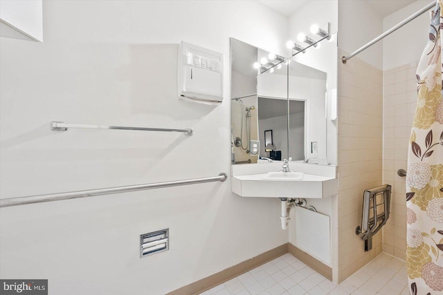 bathroom featuring tile floors