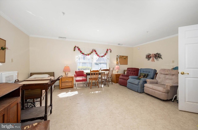 living room featuring ornamental molding and light carpet