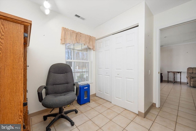 office with light tile floors