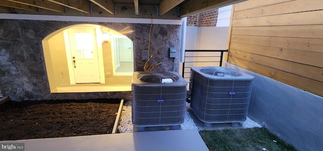 interior details with wood walls and central AC unit