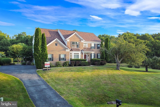 view of front of home with a front yard