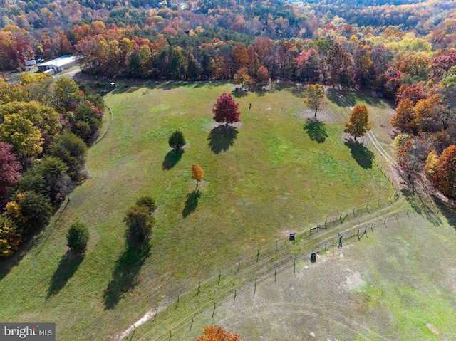 birds eye view of property featuring a rural view