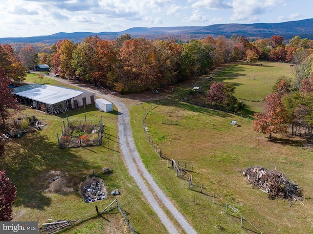 bird's eye view with a mountain view and a rural view