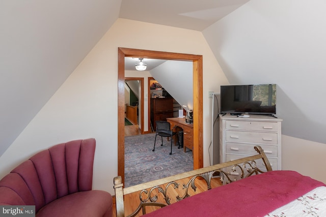 bedroom with vaulted ceiling