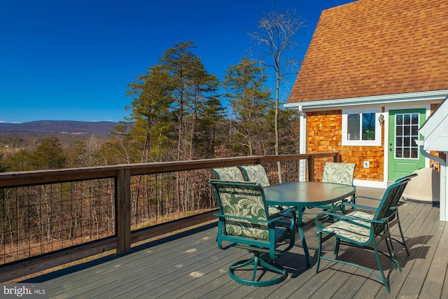 wooden terrace featuring a mountain view