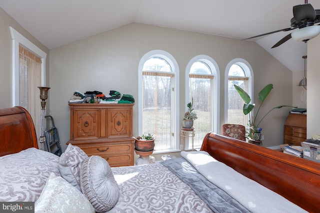 bedroom with ceiling fan and lofted ceiling