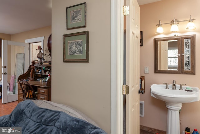 bedroom with wood-type flooring