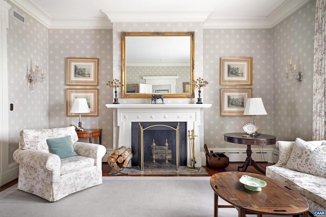 living room featuring baseboard heating and crown molding