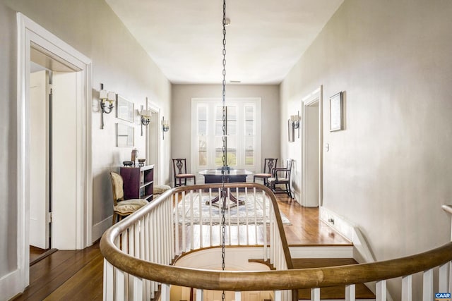 dining room with dark hardwood / wood-style flooring