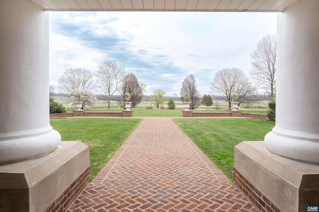 view of community featuring a lawn