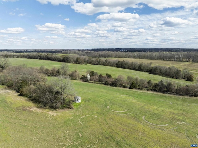 birds eye view of property featuring a rural view