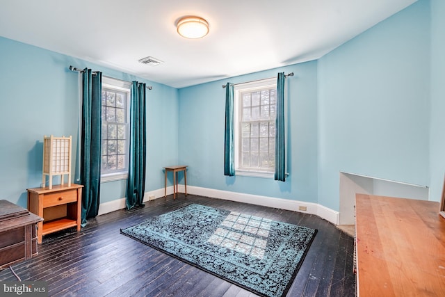 interior space with dark hardwood / wood-style floors