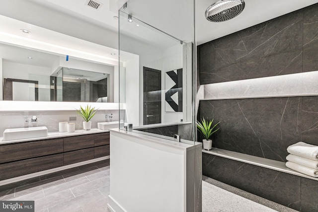 bathroom with vanity and walk in shower