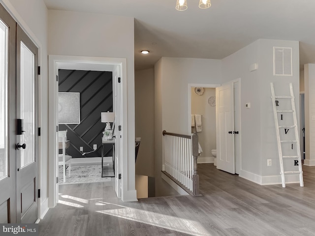 entrance foyer with light hardwood / wood-style flooring