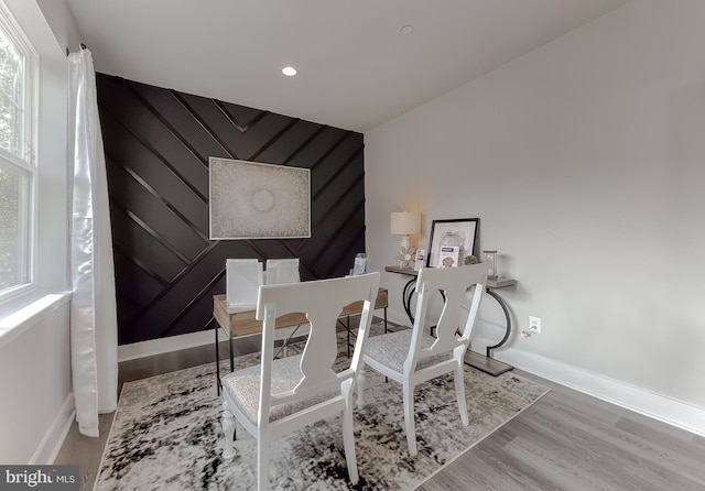 office space with wood-type flooring