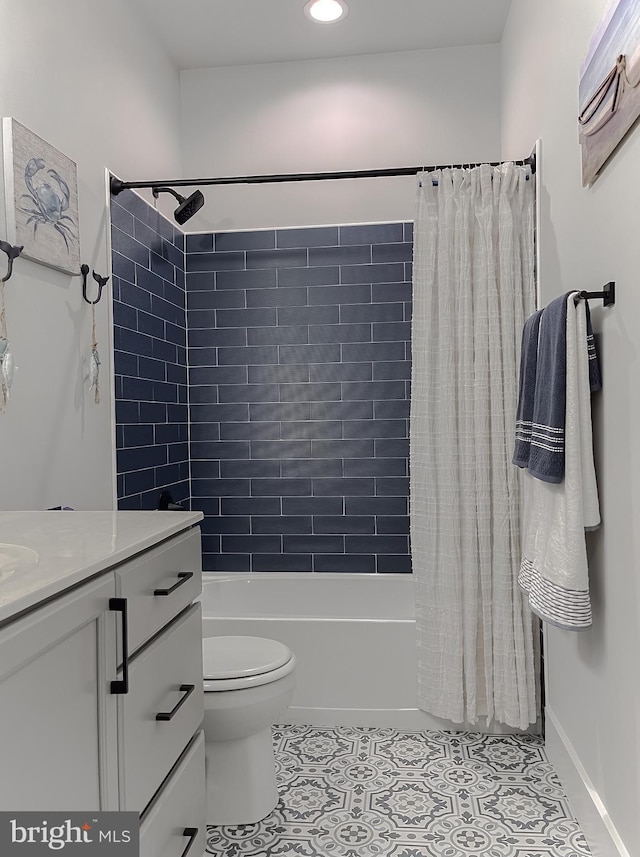 full bathroom with vanity, toilet, tile patterned flooring, and shower / bath combo