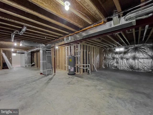 basement featuring heating unit and water heater