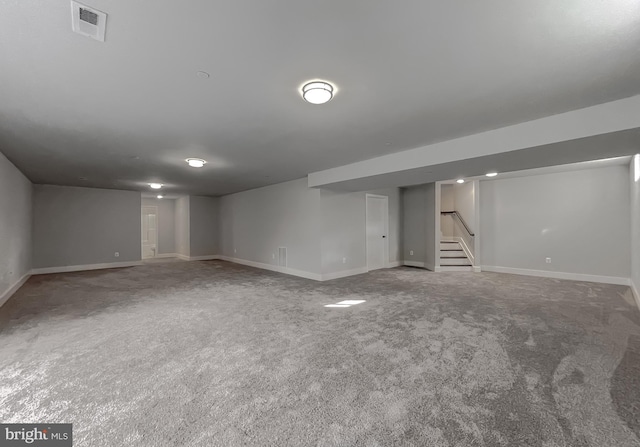 basement featuring carpet flooring