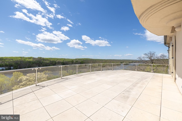 view of patio with a balcony