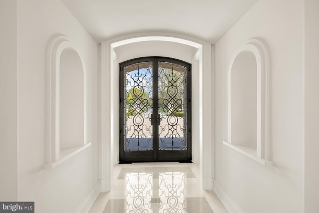 entryway featuring french doors