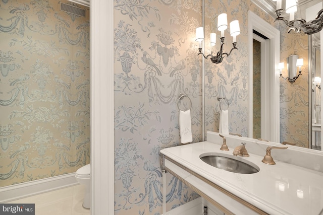 bathroom featuring tile patterned flooring, sink, and toilet