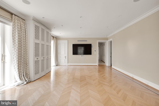 unfurnished living room featuring light parquet floors and ornamental molding