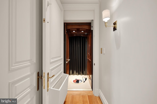 entryway with light hardwood / wood-style flooring