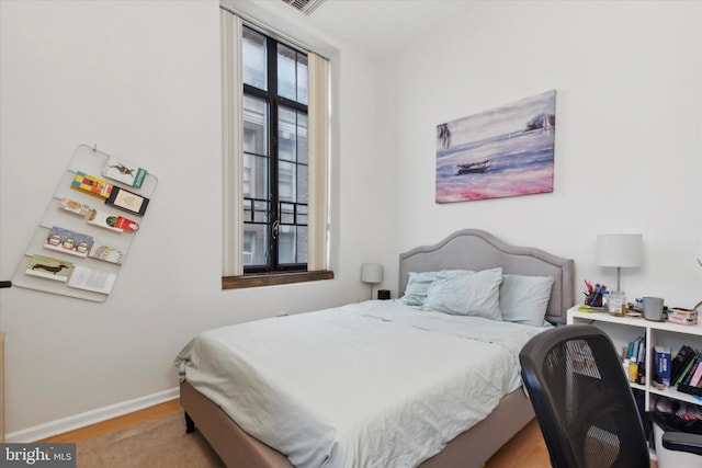 bedroom featuring light hardwood / wood-style floors