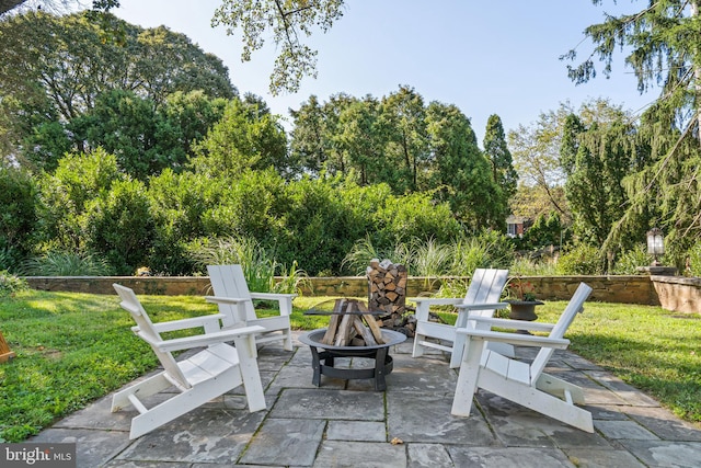 view of patio / terrace featuring a fire pit