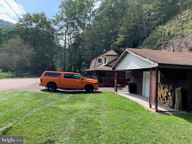 view of yard with a carport