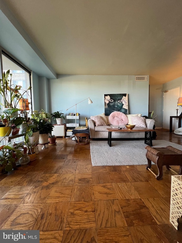 living room with parquet floors