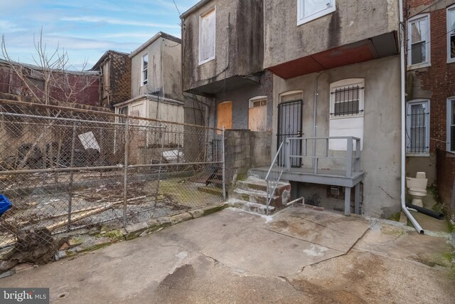 view of front of home featuring a patio area