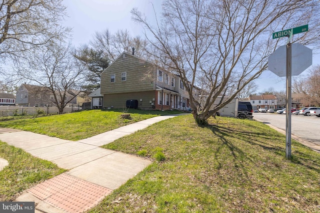 view of front of home with a front yard