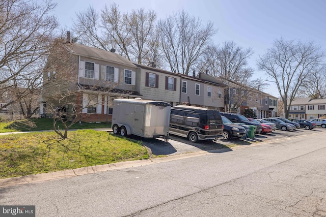 view of front of property with a front lawn