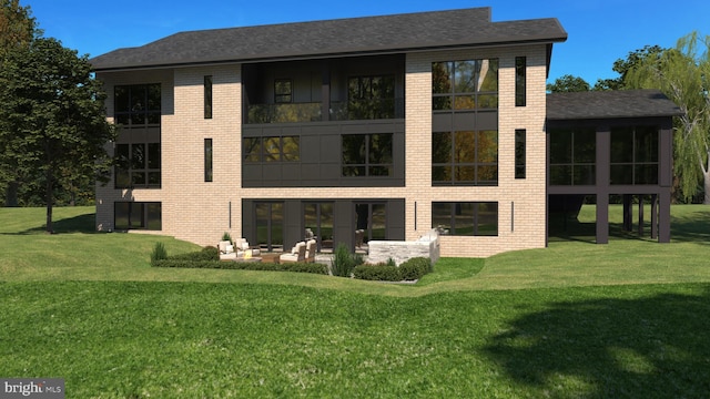 rear view of house with a yard, a patio, and a sunroom