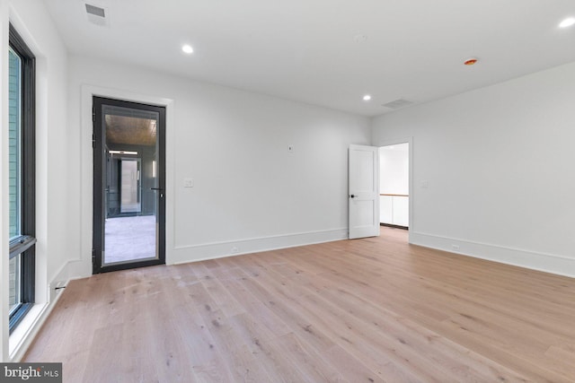 empty room featuring light hardwood / wood-style floors