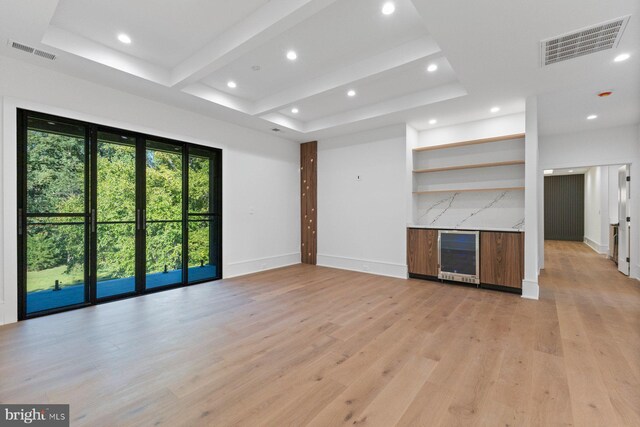 back of property featuring a sunroom and a lawn