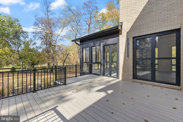 wooden terrace featuring french doors