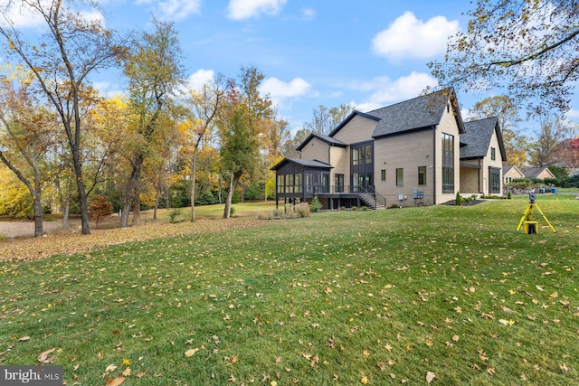 view of yard with a sunroom