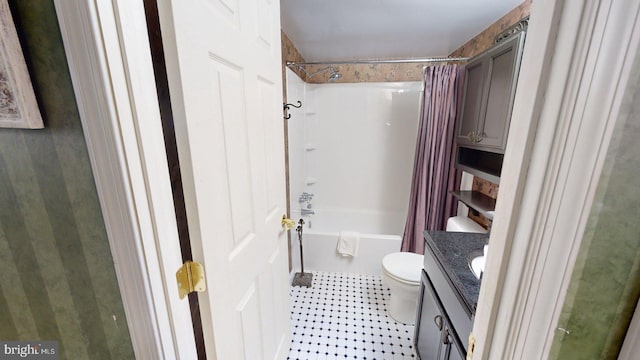 full bathroom with toilet, shower / tub combo with curtain, tile floors, and vanity