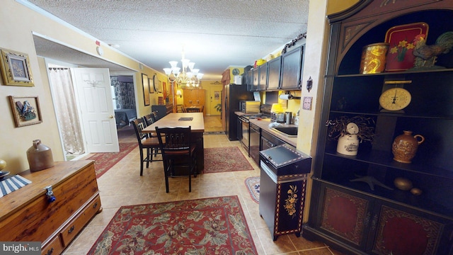 dining area featuring a chandelier, light tile floors, a textured ceiling, and crown molding