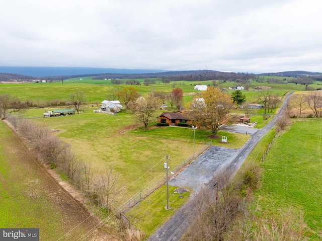 birds eye view of property featuring a rural view