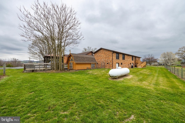 view of yard with a wooden deck