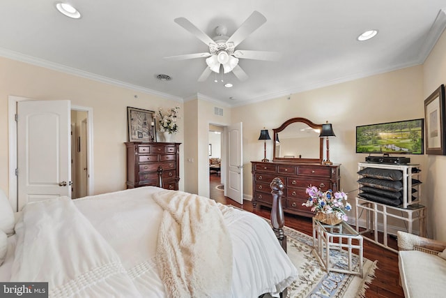 bedroom with ornamental molding, ceiling fan, and dark hardwood / wood-style floors