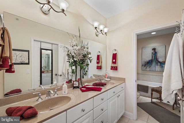 bathroom featuring dual sinks, oversized vanity, a notable chandelier, tile floors, and a tub