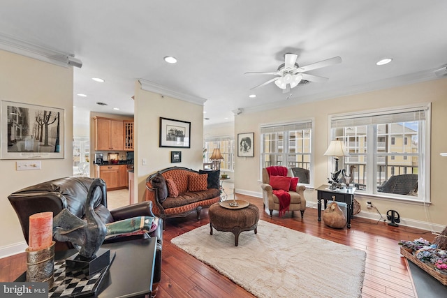 living room featuring ceiling fan, ornamental molding, dark hardwood / wood-style floors, and french doors